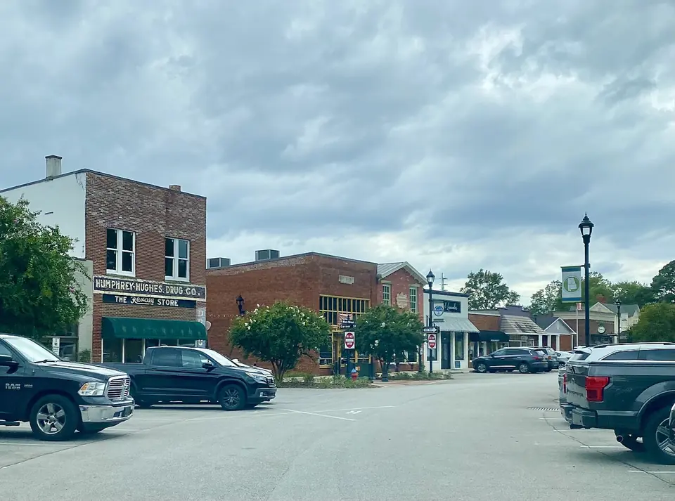 Shops and parked cars in downtown Madison, Alabama